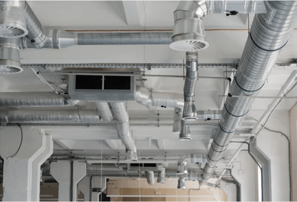 air condition and hvac system installation under bareskin ceiling before interior finishing